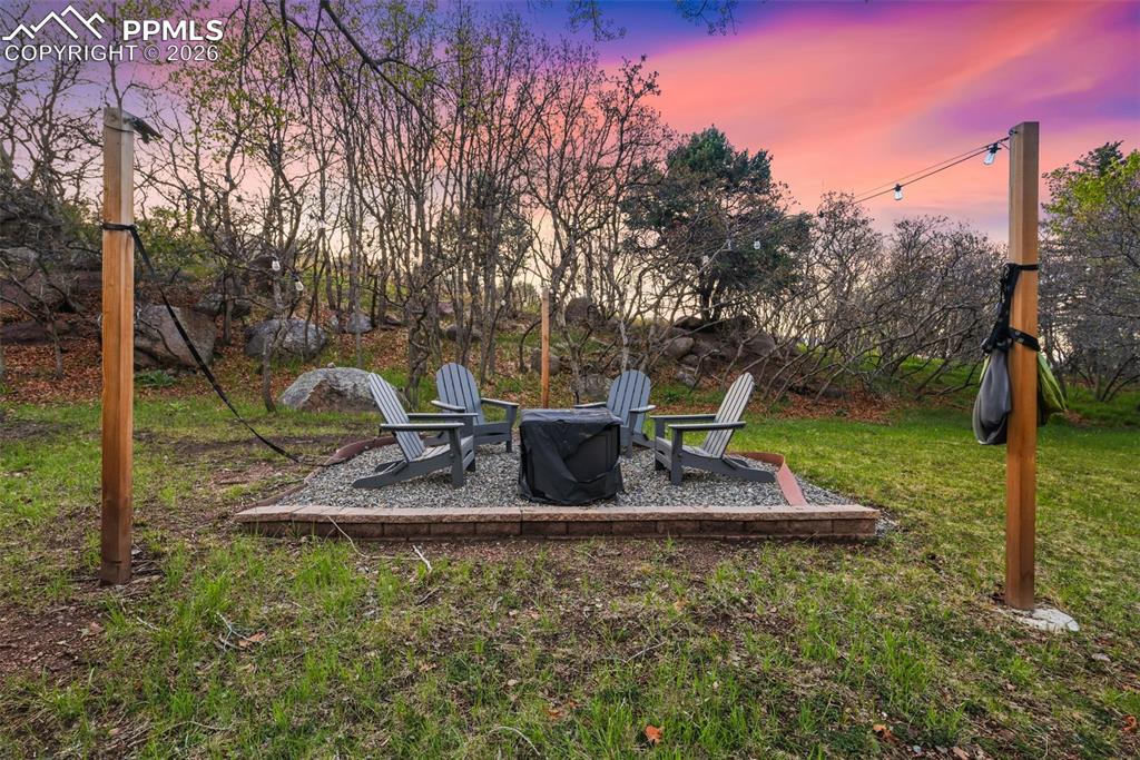 Image 5 of 47: Outdoor fire pit area