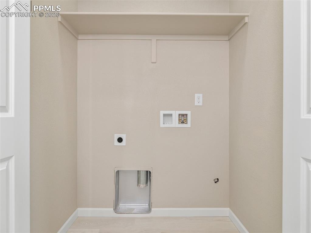 Image 13 of 26: Laundry Space