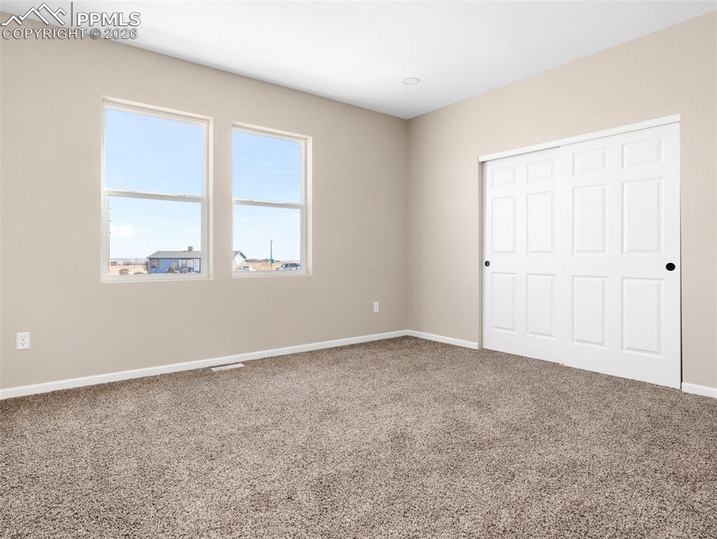 Image 14 of 26: Large Master Suite with a Walk-in closet!