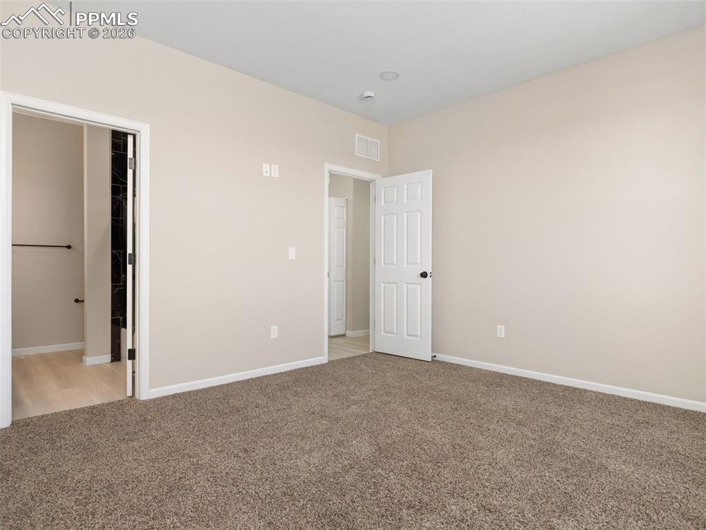 Image 15 of 26: Master Suite and entrance to 5 Piece Master bath.