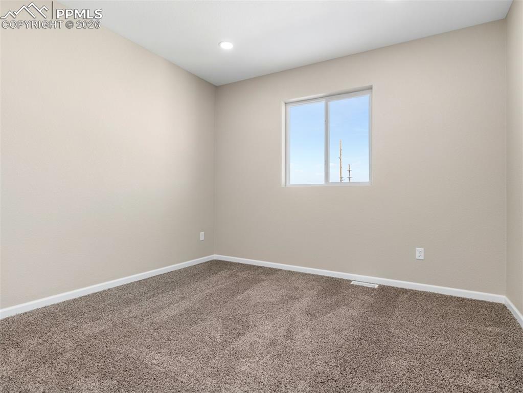 Image 20 of 26: Spacious 3rd Bedroom