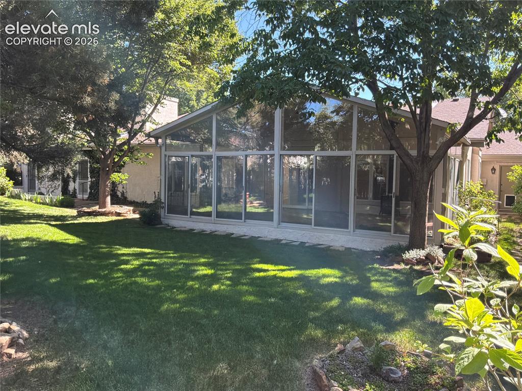 Image 9 of 21: Back house