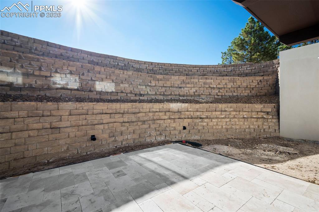 Image 25 of 33: Lower-Level walk-out patio