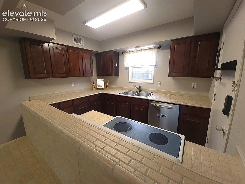 Image 6 of 25: Great lighting as Kitchen has a window!