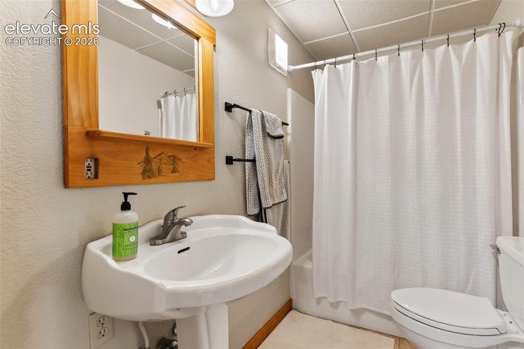 Image 19 of 37: Basement full bathroom