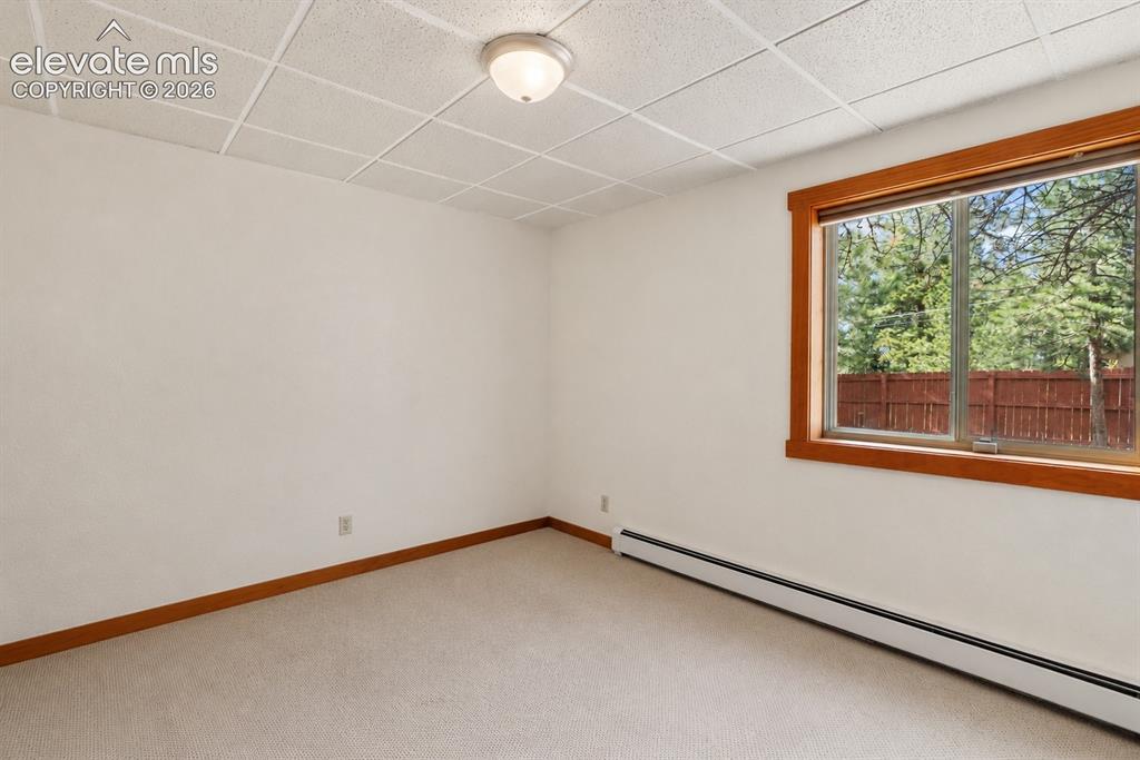 Image 21 of 37: Bedroom in basement