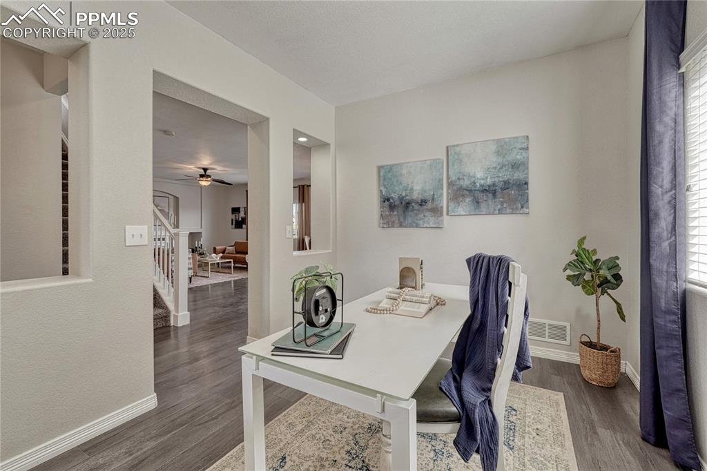 Image 3 of 50: Main level office can be used as a formal dining room or flex space