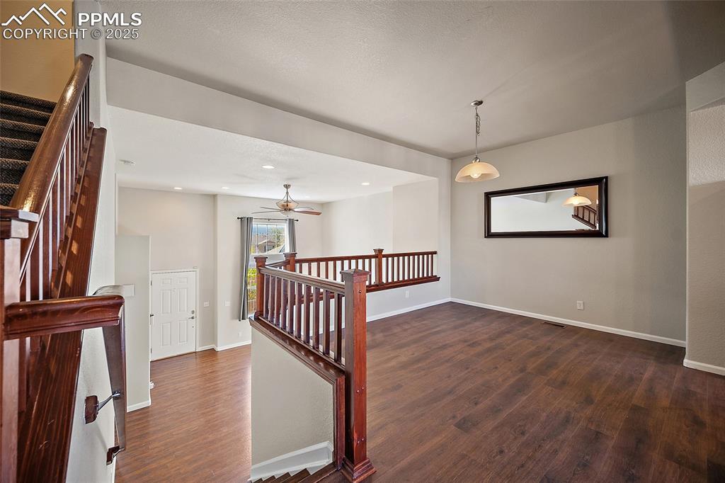 Image 10 of 50: Large area for a Table set for 6 would easily fits in this space. 