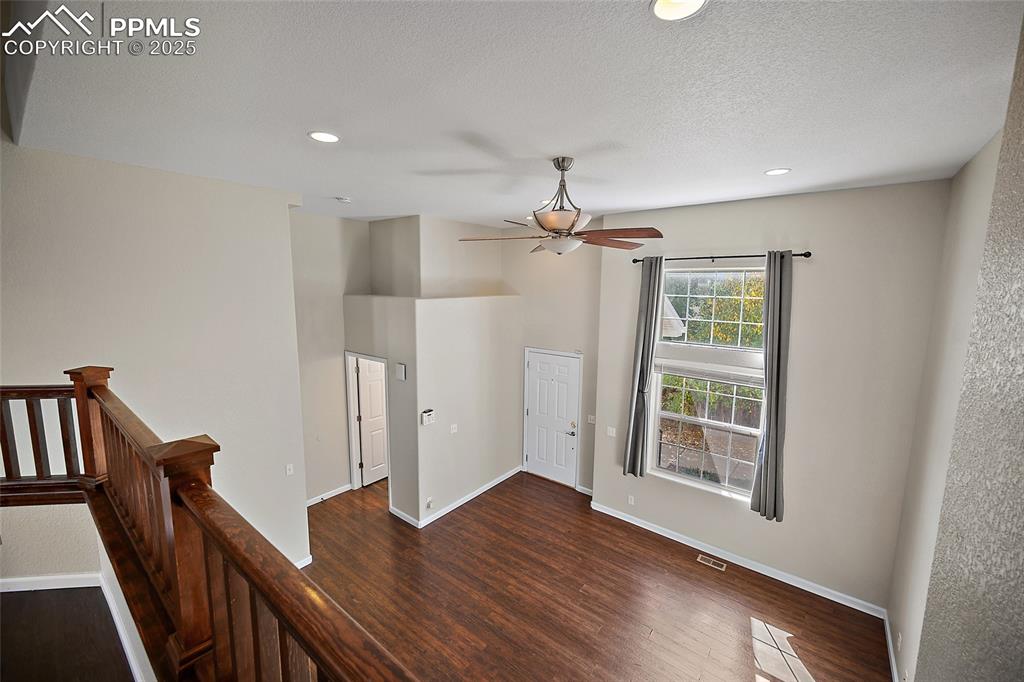 Image 13 of 50: Looking down to the Great room. 