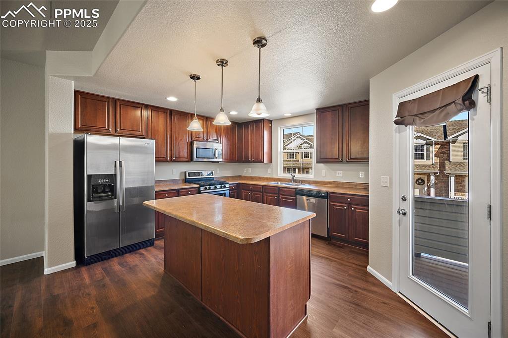 Image 17 of 50: Walk out to the Balcony for BBQ