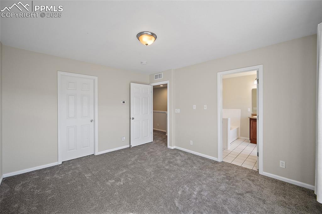 Image 27 of 50: Master Bedroom