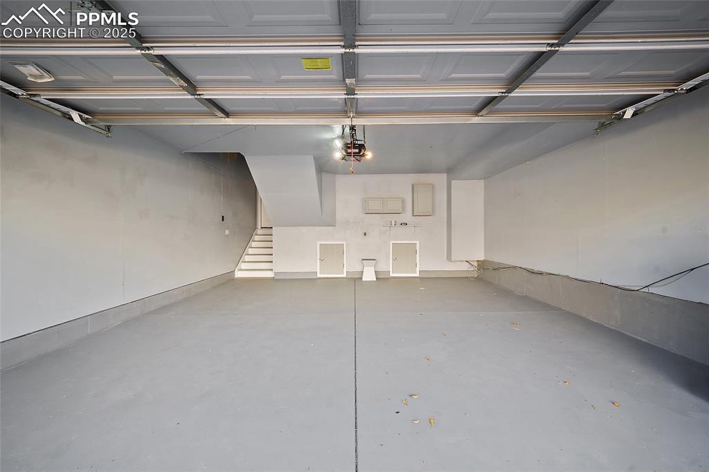 Image 43 of 50: Freshly painted oversized garage. 