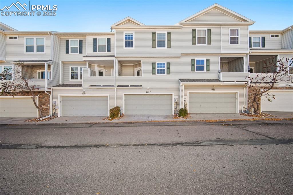Image 44 of 50: Balcony and 2 car garage!