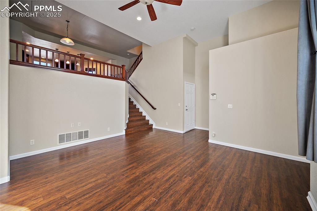 Image 7 of 50: Great room!  Door leads to the garage. 