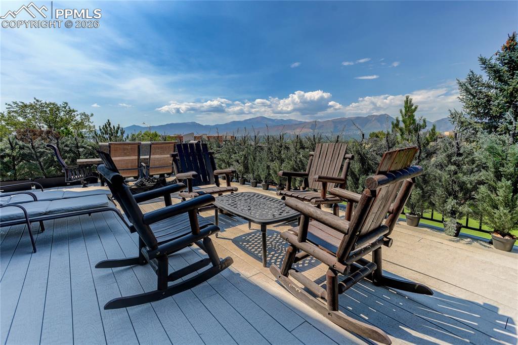 Image 10 of 30: Oversized deck showcasing mountains
