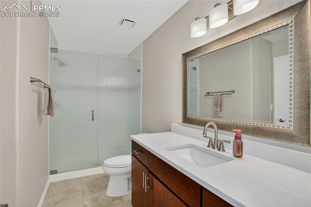 Image 15 of 30: Main level guest bath