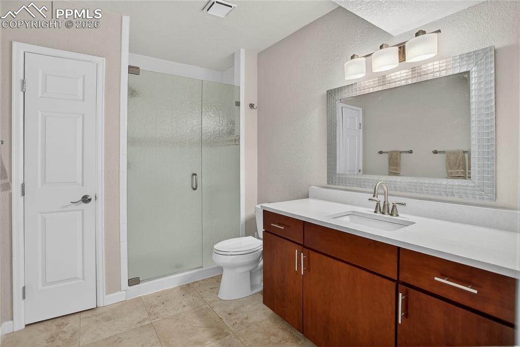 Image 27 of 30: 3/4 guest bath - lower level