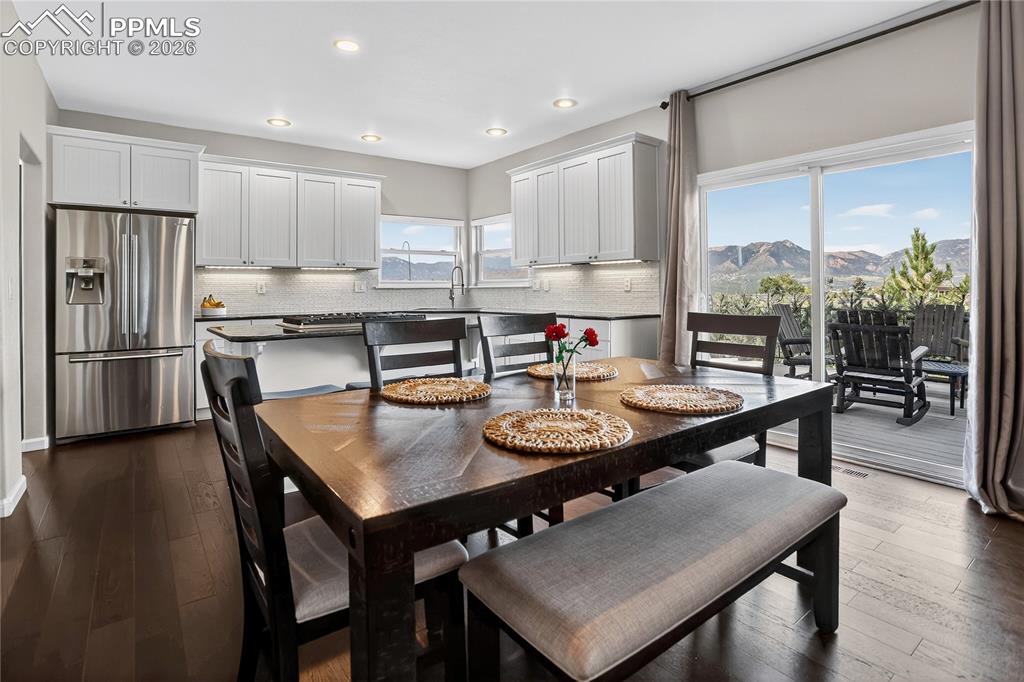 Image 9 of 30: Eat-in dining & deck access