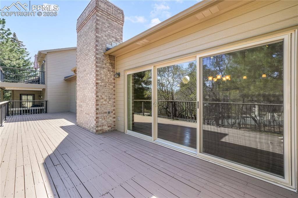 Image 17 of 50: Private deck with extended patio doors