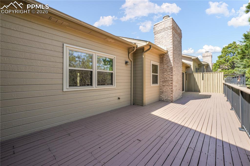 Image 19 of 50: Private deck with extended patio doors