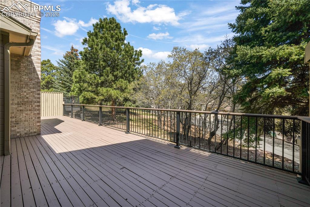 Image 20 of 50: Private deck with extended patio doors
