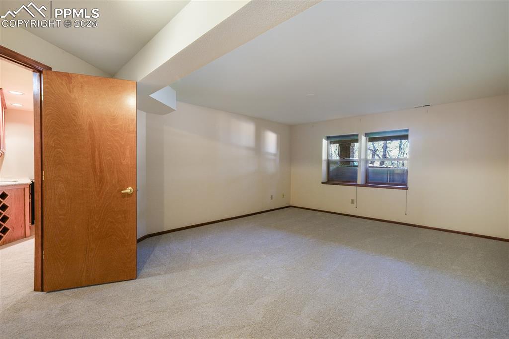 Image 38 of 50: Basement 3rd bedroom with new carpet