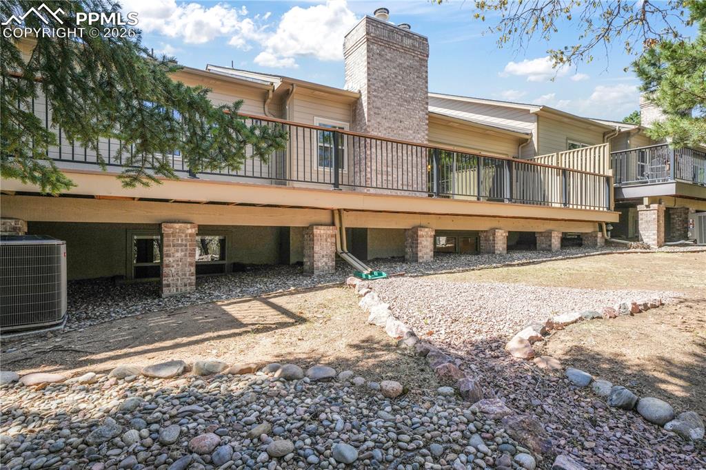 Image 44 of 50: Back deck and yard