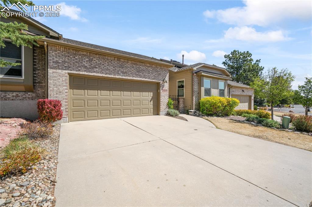 Image 45 of 50: Front of home with 2 car garage