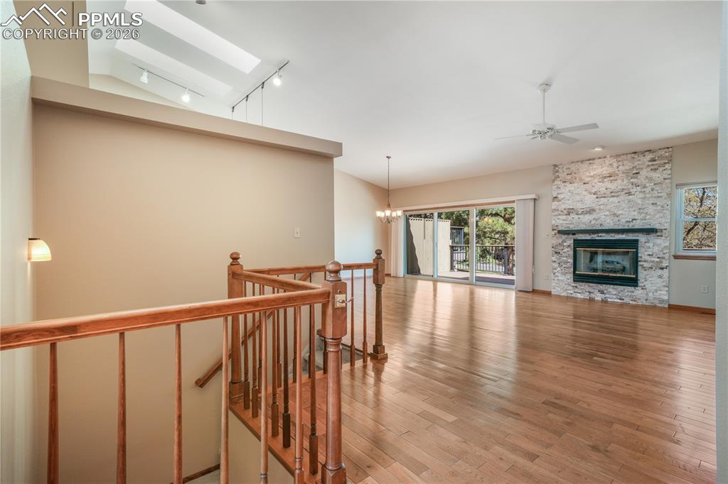 Image 8 of 50: Entry with hard wood floors in open concept
