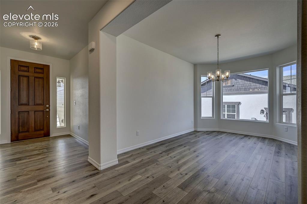 Image 13 of 35: larger dining area or use it as a music room, etc.
