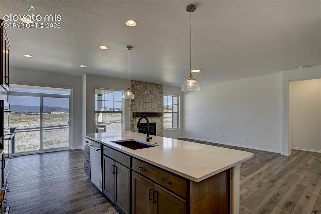 Image 17 of 35: island with sink and quiet-rated dishwasher and disposal