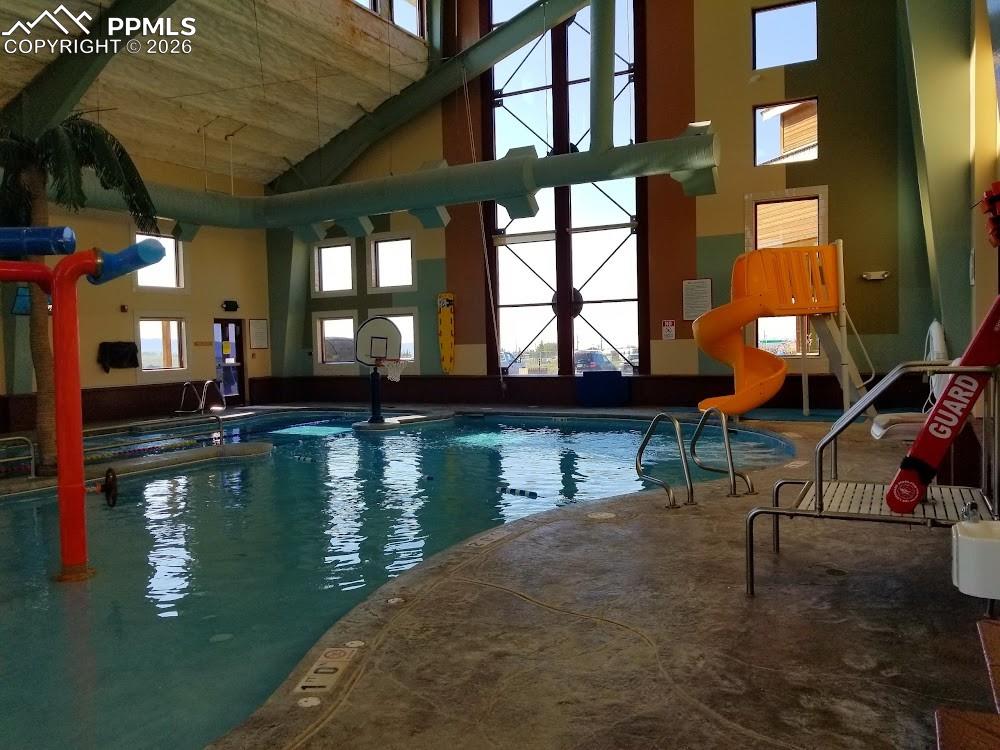 Image 16 of 19: View of indoor community pool