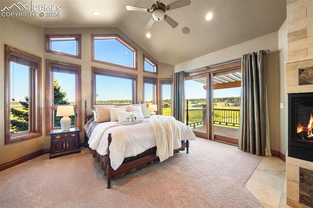 Image 7 of 50: Opulence & comfort combined in the primary suite; plush carpet, private per