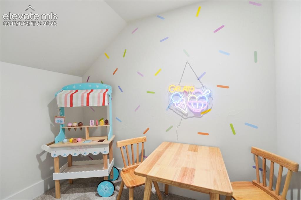 Image 34 of 50: Playroom under the stairs
