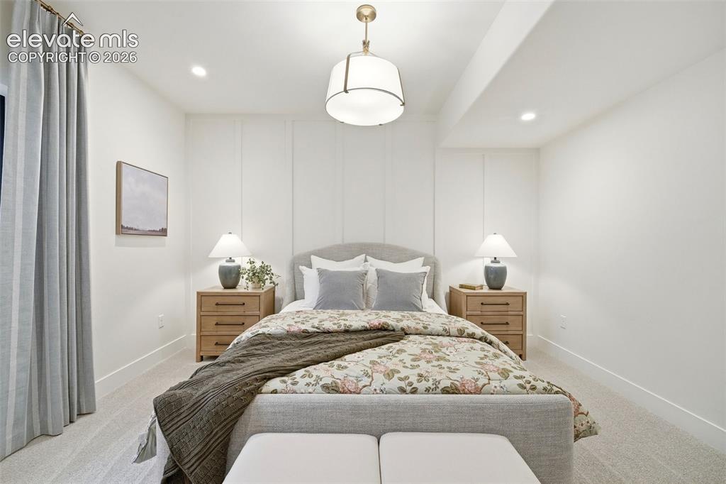 Image 38 of 50: Bedroom 5 is a Jr. Suite with 3/4 Private Bath located in the Lower Level