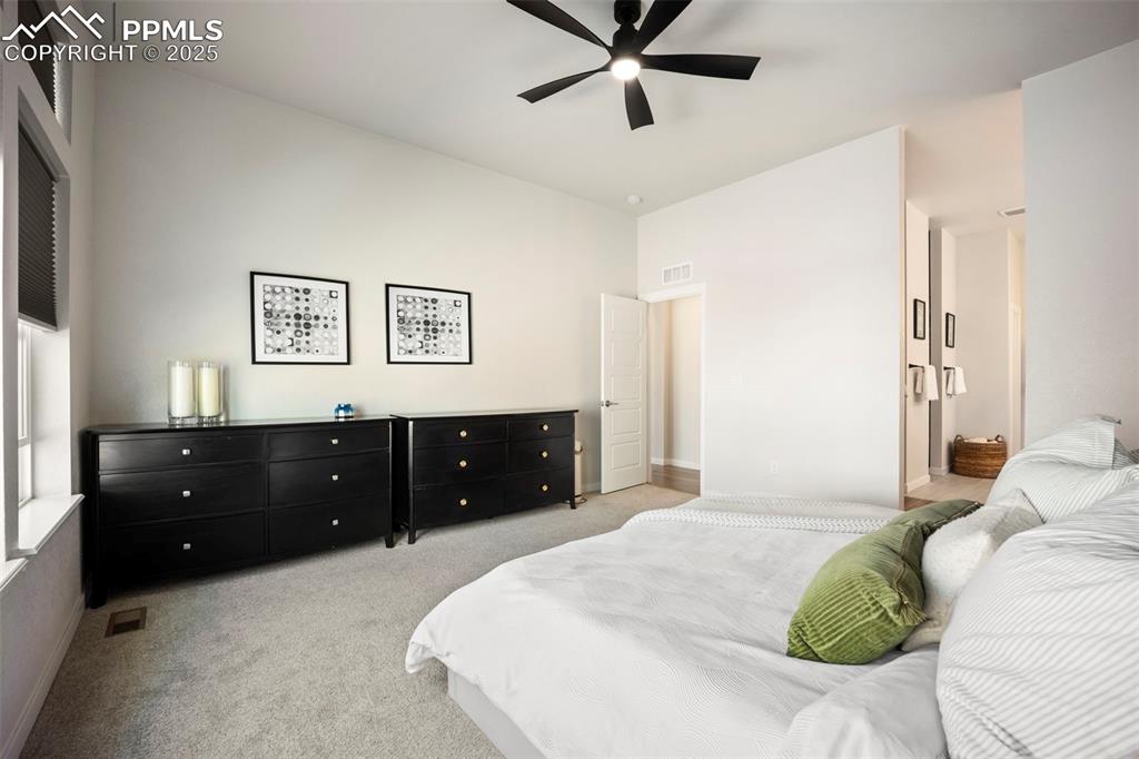 Image 22 of 50: Primary Bedroom with upgraded ceiling fan