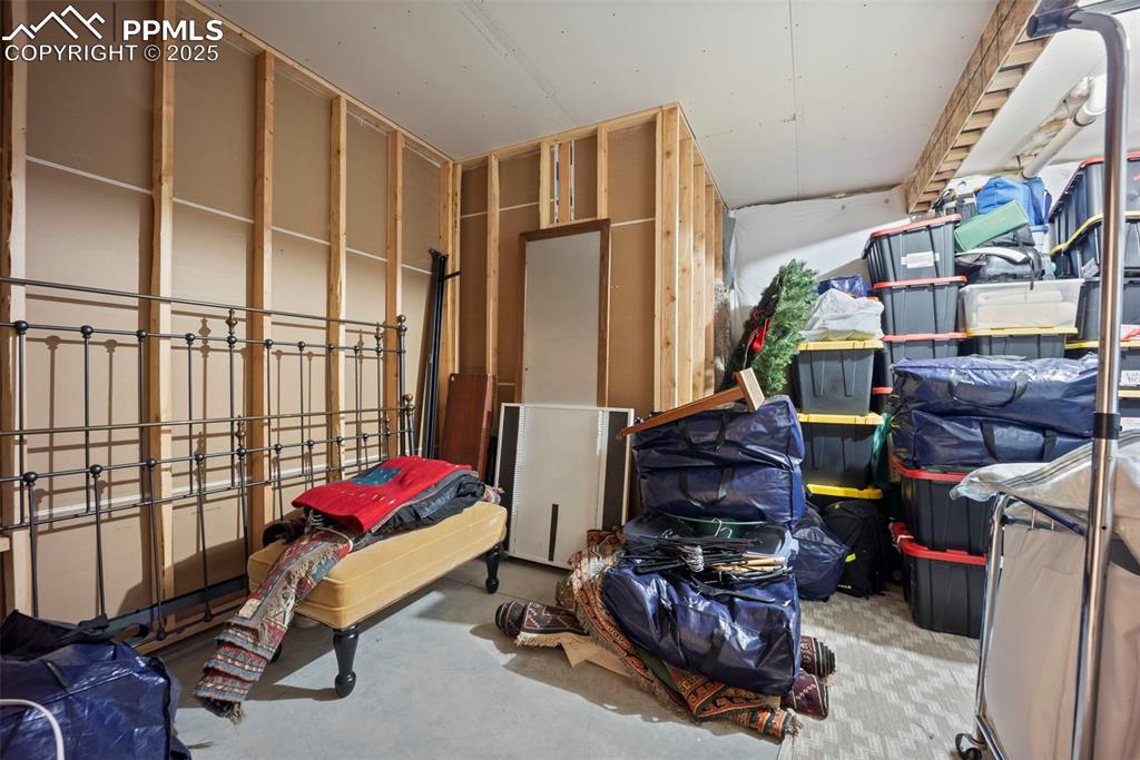 Image 43 of 50: large unfinished room; ready for 5th bedroom with pre-plumbing & egress win