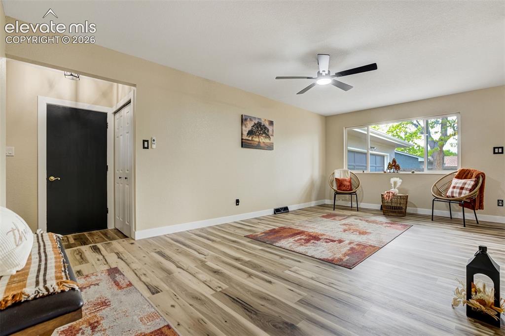 Image 10 of 50: Front entrance, coat closet, and door that leads to the oversized one car g