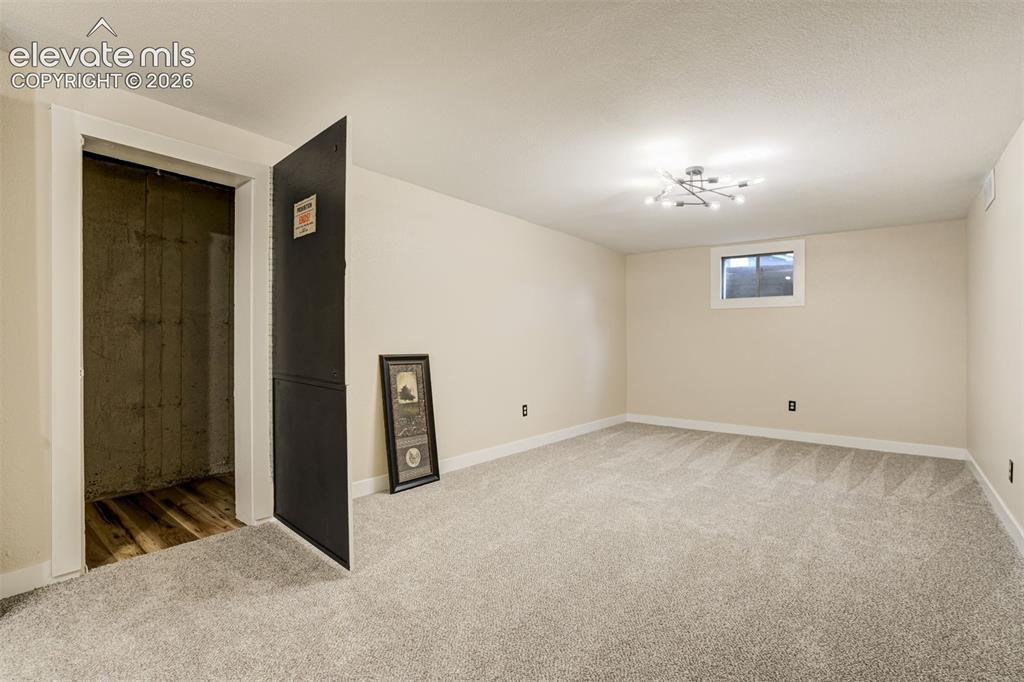 Image 31 of 50: Hidden Storage room in basement!