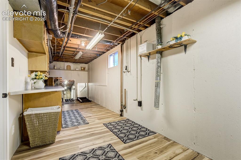 Image 34 of 50: Laundry is located in the large utility room
