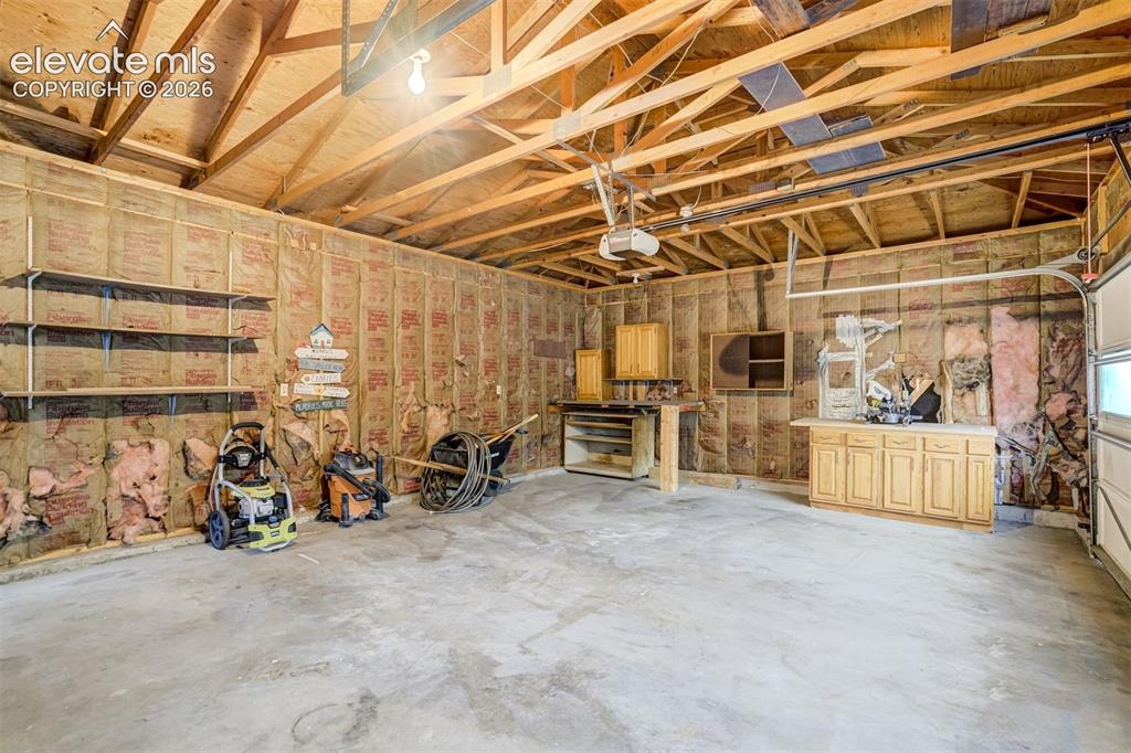 Image 45 of 50: Oversized connected two car garage