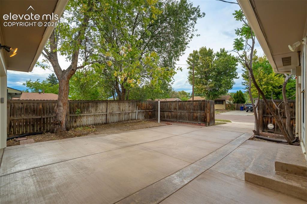 Image 46 of 50: Gated 2nd driveway