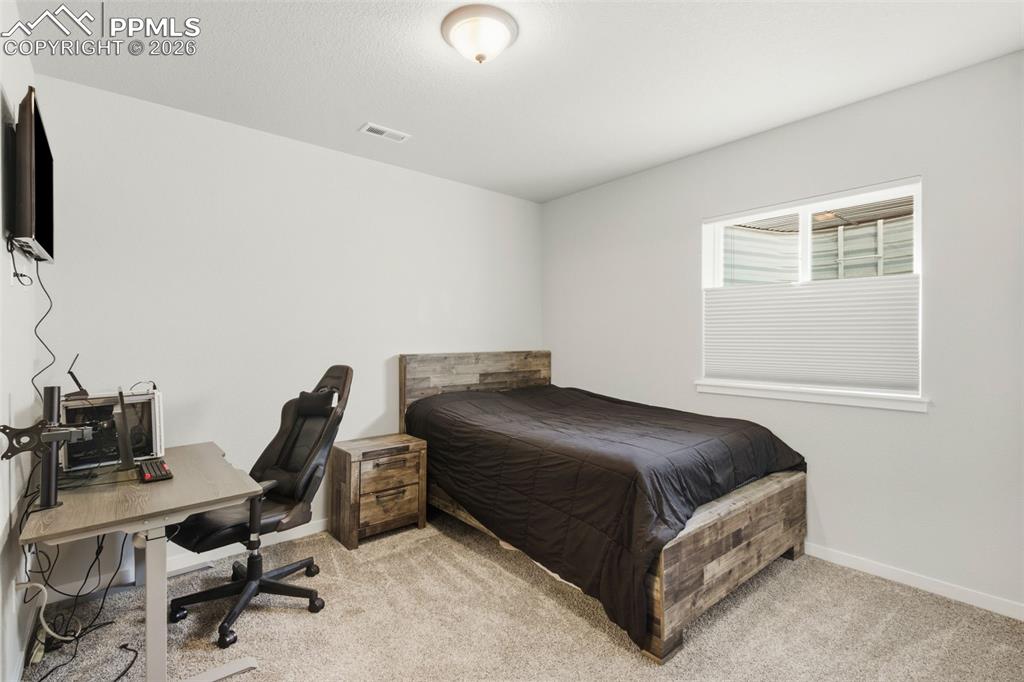 Image 32 of 50: Bedroom