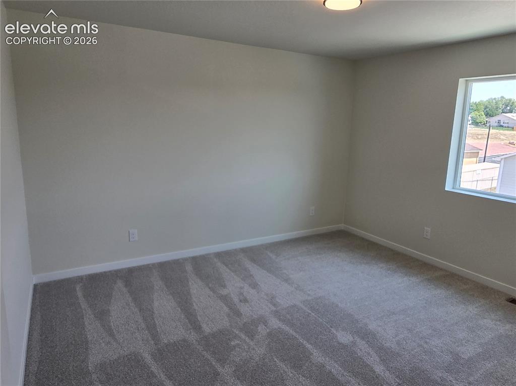 Image 10 of 30: Master Bedroom