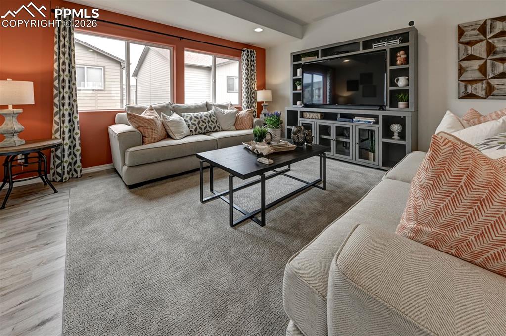 Image 6 of 14: *photo of previous model home of the same floorplan*