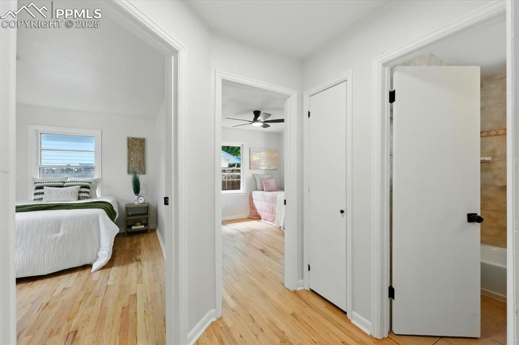 Image 13 of 32: Hall with light wood-style flooring