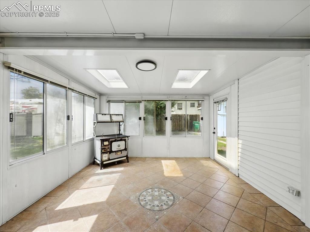 Image 32 of 32: Unfurnished sunroom featuring healthy amount of natural light