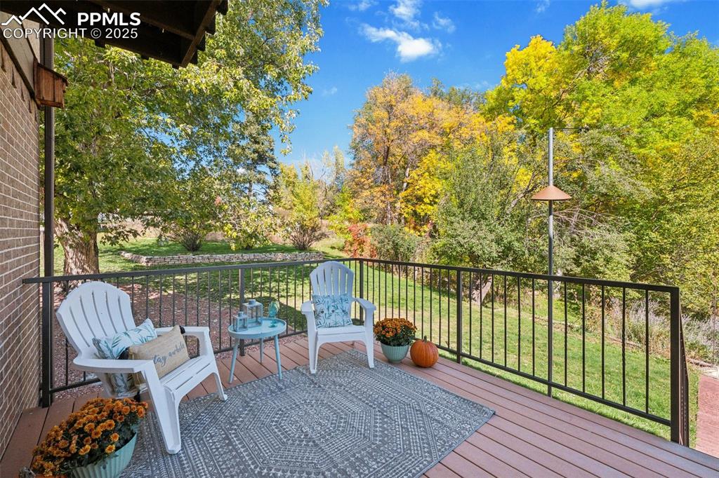 Image 2 of 49: Composite deck with views of 30 acre open space and resevior