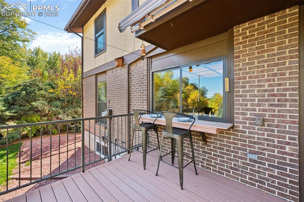 Image 24 of 49: Barr off the kitchen window, makes for a fun hangout, great for entertainin