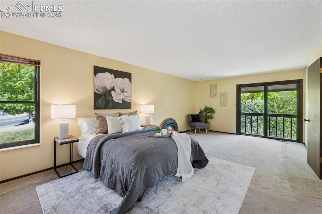 Image 3 of 49: Massive Master Suite with Juliet Balcony Views